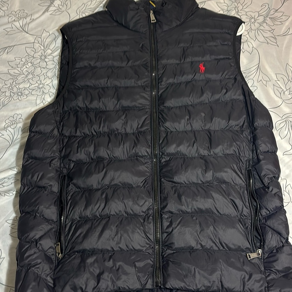 This is a black vest polo Ralph lauren small in men